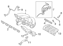 Exhaust Manifold. Turbocharger. A complete turbocharger.